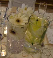 cheap wedding idea of flowers in glasses