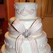 Cinderella theme wedding cake with a bow